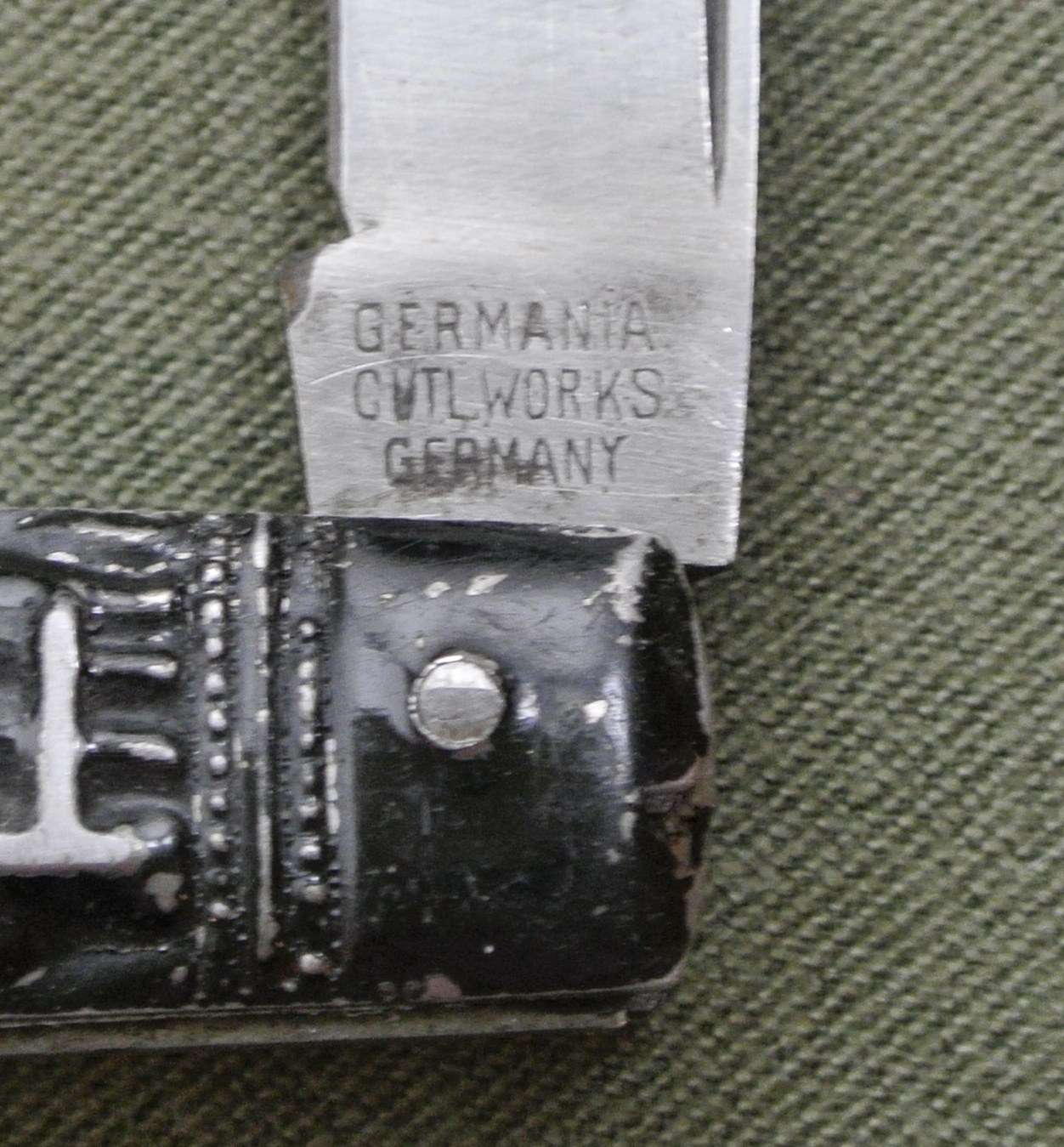 Boys knife Germania stamp.JPG